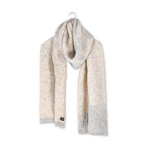 Packshot of a fluffy bulky knit scarf in white and grey.