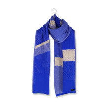 Load image into Gallery viewer, Packhshot of a jacquard knit scarf in cobalt blue and beige. The scarf has an abstract geometric bitmap pattern.
